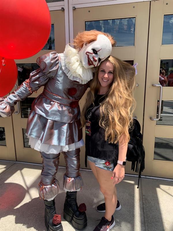 Montana Tenny, pictured with Pennywise and a red balloon. 